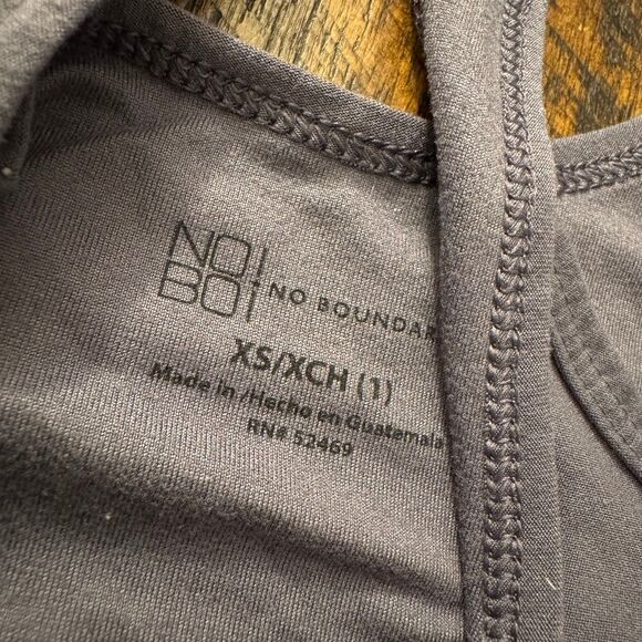 Soft charcoal gray racerback tank with cheeky “Kinda Care, Kinda Don’t - Picture 3 of 4